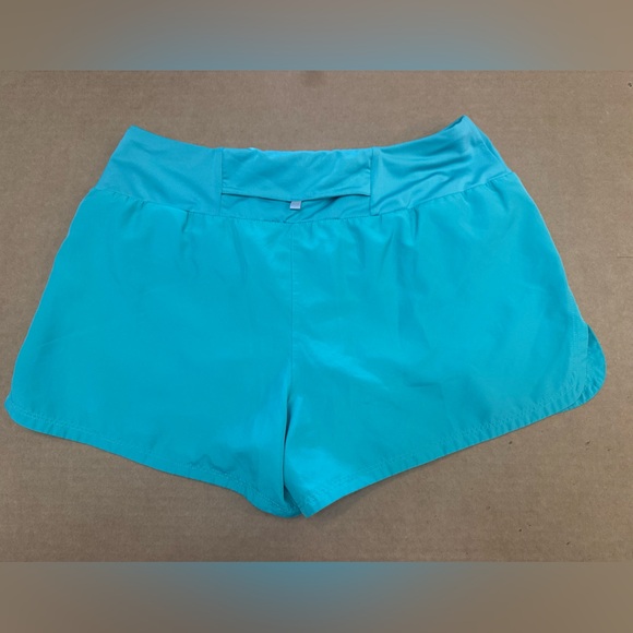 Nike Teal Athletic Women's Shorts with White Swoosh - Picture 2 of 3
